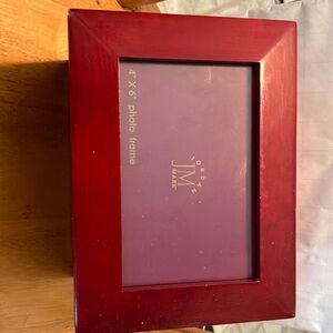 New.  Redwood stained wood storage holder for over 120 pictures. Perfect